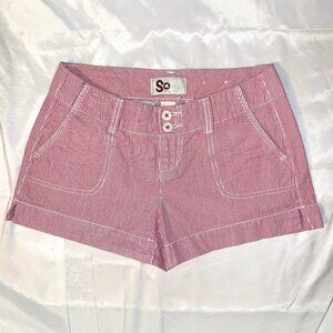 Low-waisted Red and white striped shorts with cute button details